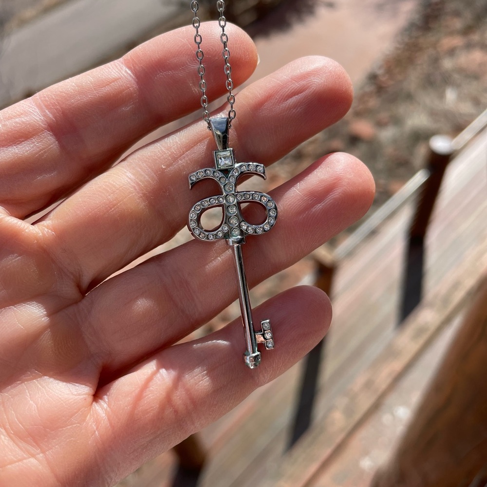 Arbonne Key to Success Double A rhinestone necklace